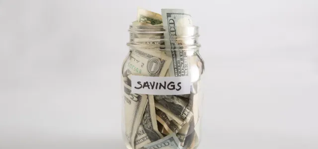 Closeup of Mason jar with money for savings